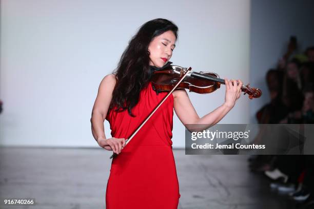 Musician performs on stage for the CAAFD Emerging Designer Collective during New York Fashion Week: The Shows at at Industria Studios on February 10,...