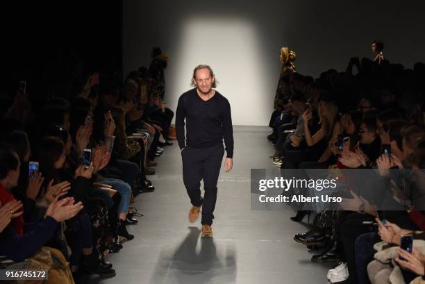 Designer Custo Dalmau walks the runway at the Custo Barcelona show during New York Fashion Week: The Shows at Pier 59 on February 10, 2018 in New...