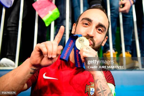 Portugals Ricardinho kisses his gold medal after winning the European Futsal Championship at Arena Stozice in Ljubljana, Slovenia on February 10,...