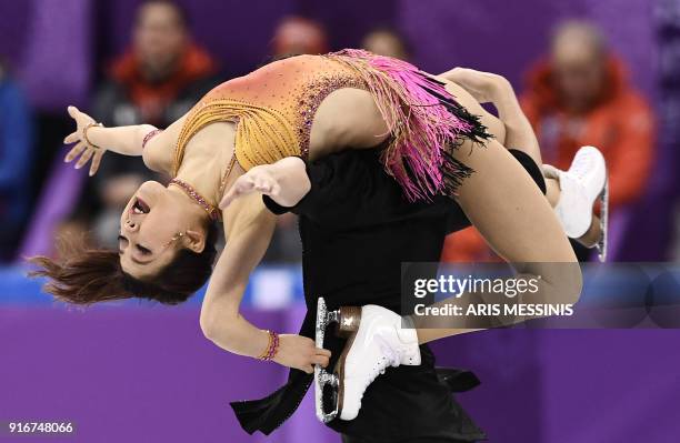 Japan's Kana Muramoto and Japan's Chris Reed compete in the figure skating team event ice dance short dance during the Pyeongchang 2018 Winter...