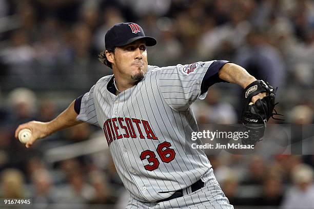 Joe Nathan of the Minnesota Twins pitches against the New York Yankees in Game Two of the ALDS during the 2009 MLB Playoffs at Yankee Stadium on...