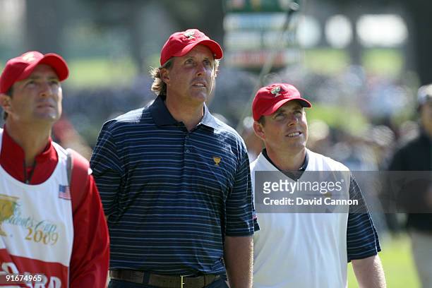 Phil Mickelson of the USA Team with his playing partner Justin Leonard at the 7th hole during the Day Two Fourball Matches in The Presidents Cup at...