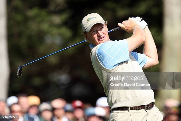 Ernie Els of South Africa and the International Team hits his tee shot at the 6th hole during the Day Two Fourball Matches in The Presidents Cup at...