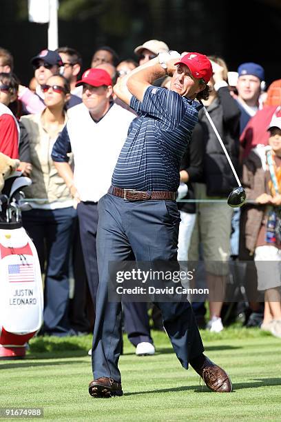 Phil Mickelson of the USA Team drives at the 6th hole watched by his playing partner Justin Leonard during the Day Two Fourball Matches in The...