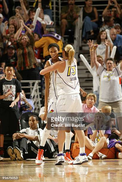 Penny Taylor celebrates with DeWanna Bonner of the Phoenix Mercury against the Indiana Fever during Game Five of the WNBA Finals on October 9, 2009...