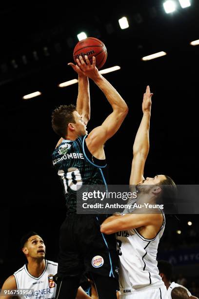 Tom Abercrombie of the Breakers puts up a shot against Chris Goulding of United during the round 18 NBL match between the New Zealand Breakers and...