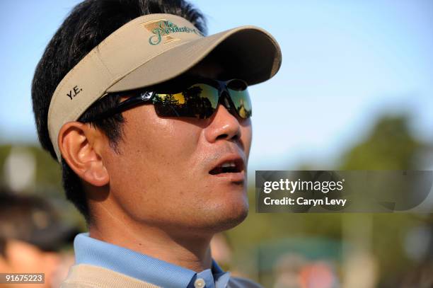 Yang watches his teammates during the second round four-ball matches for The Presidents Cup at Harding Park Golf Club on October 9, 2009 in San...