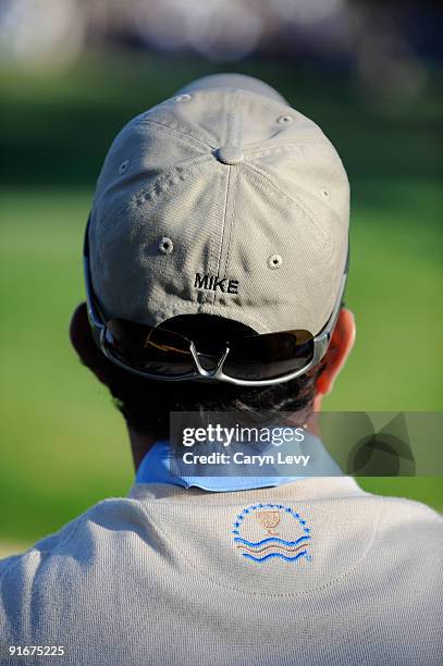 Mike Weir watches his teammates during the second round four-ball matches for The Presidents Cup at Harding Park Golf Club on October 9, 2009 in San...