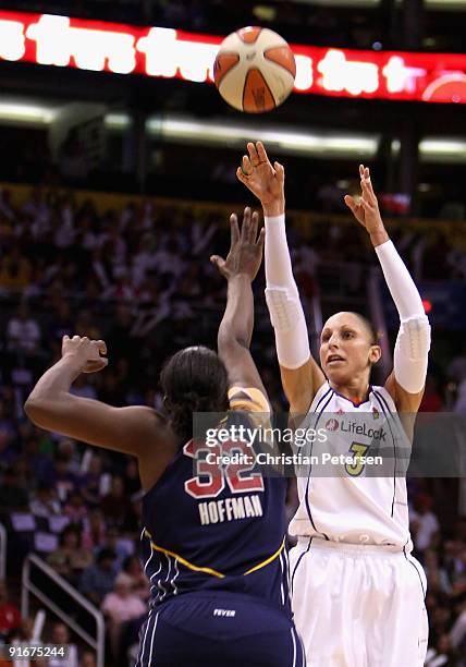 Diana Taurasi of the Phoenix Mercury puts up a shot over Ebony Hoffman of the Indiana Fever in Game Five of the 2009 WNBA Finals at US Airways Center...