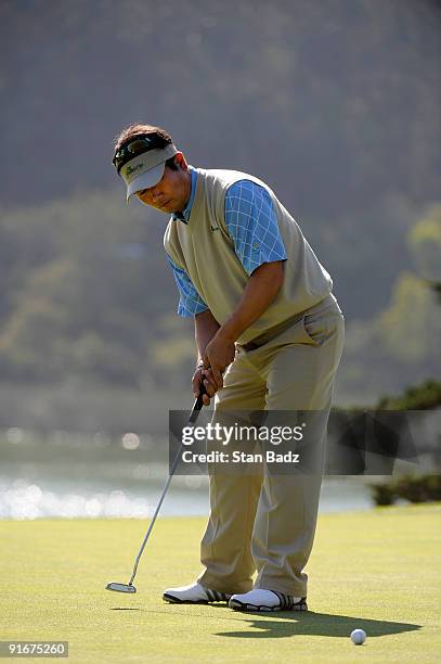 Yang hits his putt at the 14th green during the second round four-ball matches for The Presidents Cup at Harding Park Golf Club on October 9, 2009 in...