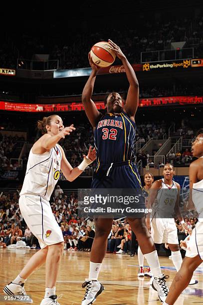 Ebony Hoffman of the Indiana Fever pulls down a rebound against the Phoenix Mercury in Game five of the WNBA Finals played on October 9, 2009 at U.S....