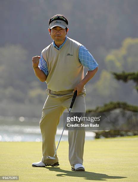 Yang reacts to his putt at the 14th green during the second round four-ball matches for The Presidents Cup at Harding Park Golf Club on October 9,...
