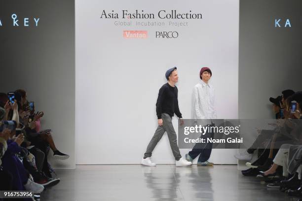 Designers Jarno Leppanen and Key Chow walk the runway for Ka Wa Key at Asia Fashion Collection during New York Fashion Week: The Shows Gallery II at...