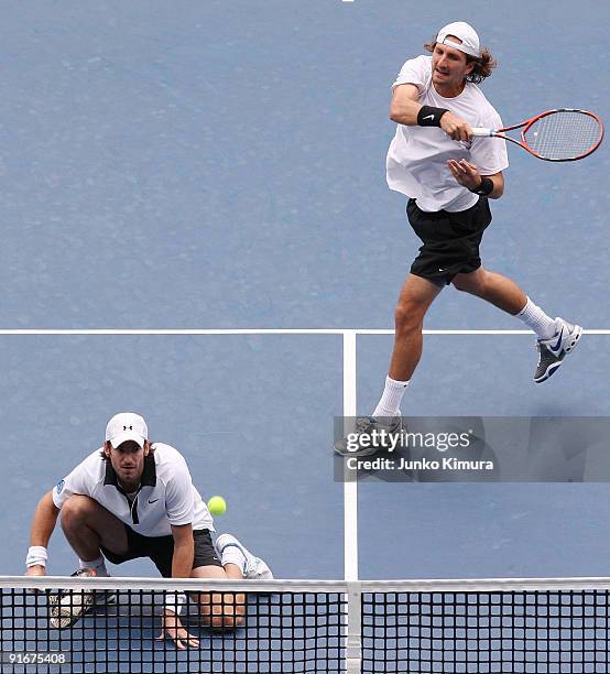 Christopher Kas of Germany and Jaroslav Levinsky of the Czech Republic return a shot in their doubles match against Ross Hutchins of Great Britain...