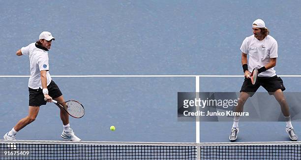 Christopher Kas of Germany and Jaroslav Levinsky of the Czech Republic return a shot in their doubles match against Ross Hutchins of Great Britain...