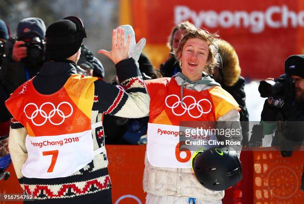 Gold medalist Redmond Gerard of the United States celebrates with silver medalist Max Parrot of Canada during the Snowboard Men's Slopestyle Final on...