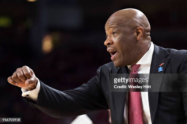 Head Coach Mike Anderson of the Arkansas Razorbacks pumps up his team during a game against the Vanderbilt Commodores at Bud Walton Arena on February...
