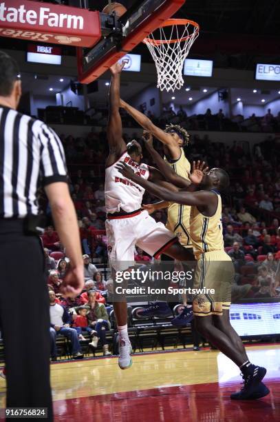 Western Kentucky Hilltoppers forward Dwight Coleby gets the basket and his would by Florida International Golden Panthers forward Osasumwen Osaghae...