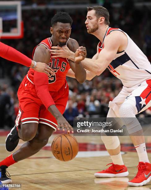 Bobby Portis of the Chicago Bulls s fouled by Jason Smith of the Washington Wizards at the United Center on February 10, 2018 in Chicago, Illinois....