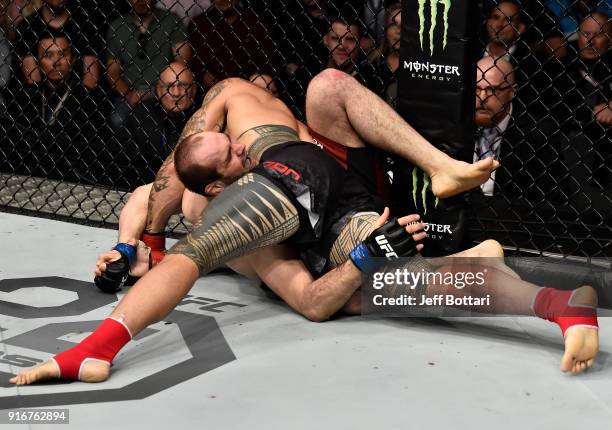 Tyson Pedro of Australia submits Saparbek Safarov of Russiain their light heavyweight bout during the UFC 221 event at Perth Arena on February 11,...