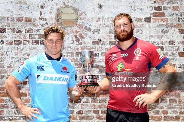 Scott Higginbotham of the Reds and Michael Hooper of the Waratahs pose for a photo during the 2018 Super Rugby Season Launch at Brisbane Powerhouse...