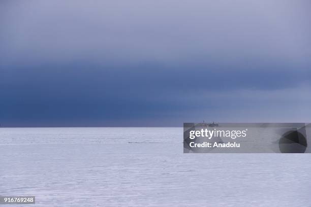 View from the frozen Lake Michigan is seen after the blizzard in Chicago, Illinois, United States on February 10, 2018.