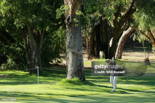James Nitties of Australia hits his second shot on the 2nd hole during day four of the World Super 6 at Lake Karrinyup Country Club on February 11,...