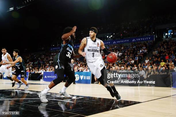 Josh Boone of United drives against Rakeem Christmas of the Breakers during the round 18 NBL match between the New Zealand Breakers and Melbourne...