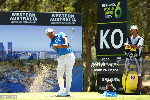 Yusaku Miyazato of Japan plays his tee shot on the knock out hole in the round 2 match against Kiradech Aphibarnrat of Thailand during day four of...