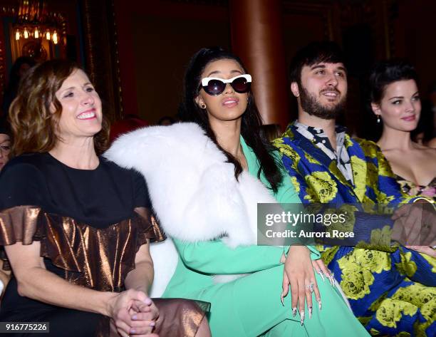 Molly Shannon, Cardi B, Brad Walsh, and Jaimie Alexander sit front row at the Christian Siriano show The Grand Lodge on February 10, 2018 in New York...