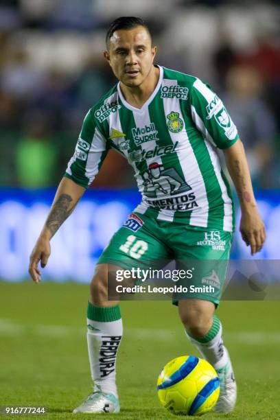 Luis Montes of Leon drives the ball on during the 6th round match between Leon and Puebla as part of the Torneo Clausura 2018 Liga MX at Leon Stadium...