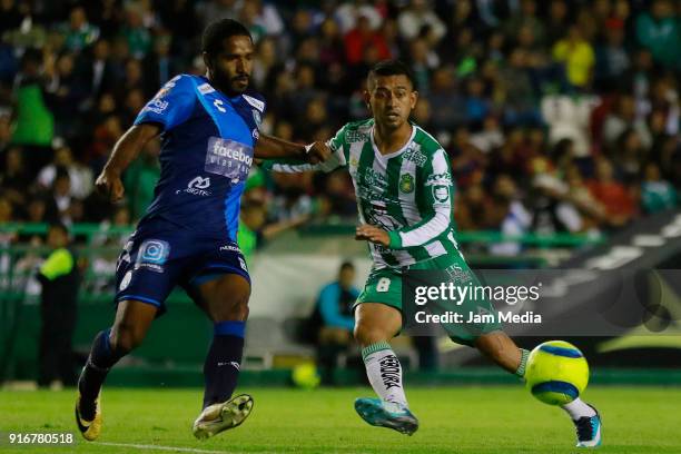 Brayan Angulo of Puebla and Elias Hernandez of Leon fight for the ball during the 6th round match between Leon and Puebla as part of the Torneo...