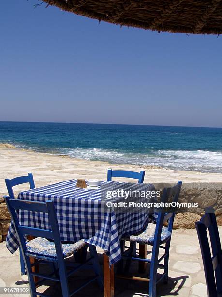 traditional restaurant by the sea - restaurant chairs stock pictures, royalty-free photos & images