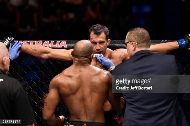 Yoel Romero of Cuba checks on Luke Rockhold in their interim middleweight title bout during the UFC 221 event at Perth Arena on February 11, 2018 in...
