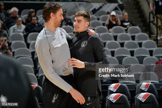 Pau Gasol of the San Antonio Spurs and Juan Hernangomez of the Denver Nuggets are seen before the game on January 30, 2018 at the AT&T Center in San...