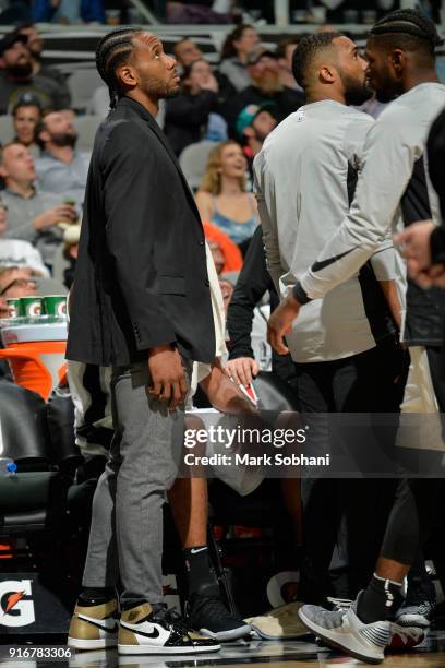 Kawhi Leonard of the San Antonio Spurs looks on during the game against the Denver Nuggets on January 30, 2018 at the AT&T Center in San Antonio,...