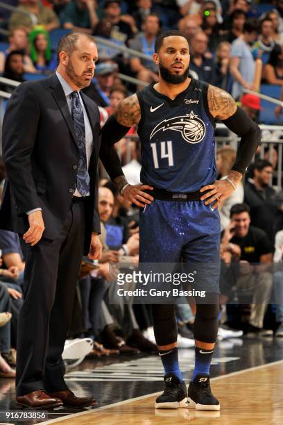 Head Coach Frank Vogel of the Orlando Magic speaks to D.J. Augustin of the Orlando Magic during the gane against the Milwaukee Bucks on February 10...