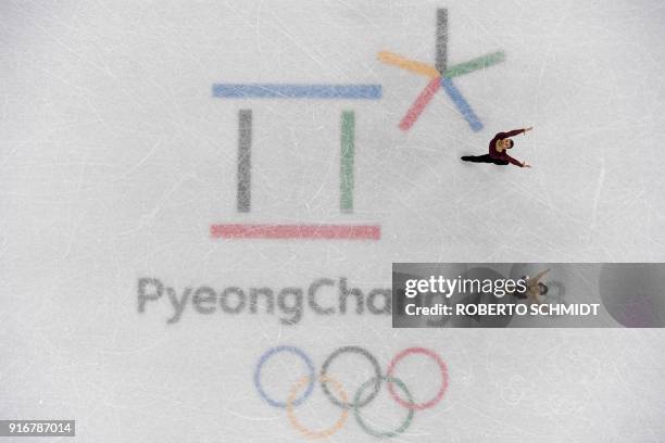 Canada's Meagan Duhamel and Canada's Eric Radford compete in the figure skating team event pair skating free skating during the Pyeongchang 2018...