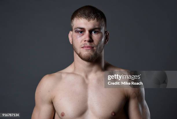 Jake Matthews of Australia poses for a post fight portrait backstage during the UFC 221 event at Perth Arena on February 11, 2018 in Perth, Australia.