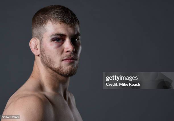 Jake Matthews of Australia poses for a post fight portrait backstage during the UFC 221 event at Perth Arena on February 11, 2018 in Perth, Australia.