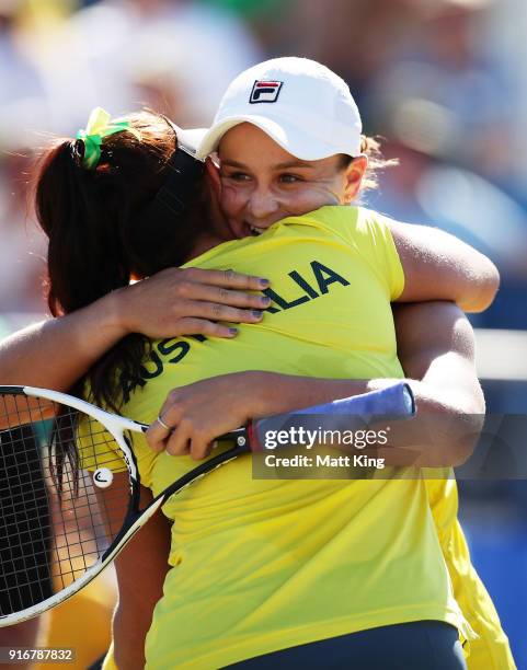 Ashleigh Barty and Casey Dellacqua of Australia celebrate victory in the doubles match against Lyudmyla Kichenok and Nadiia Kichenok of Ukraine...