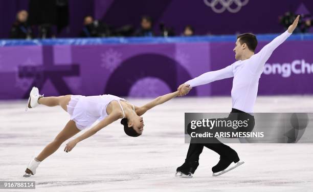 Russia's Natalia Zabiiako and Russia's Alexander Enbert compete in the figure skating team event pair skating free skating during the Pyeongchang...