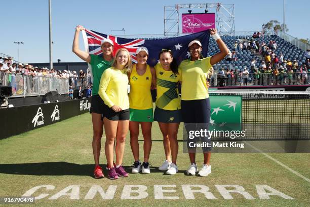 Australia captain Alicia Molik, Daria Gavrilova, Ashleigh Barty, Casey Dellacqua and Destanee Aiava of Australia celebrate victory during the Fed Cup...