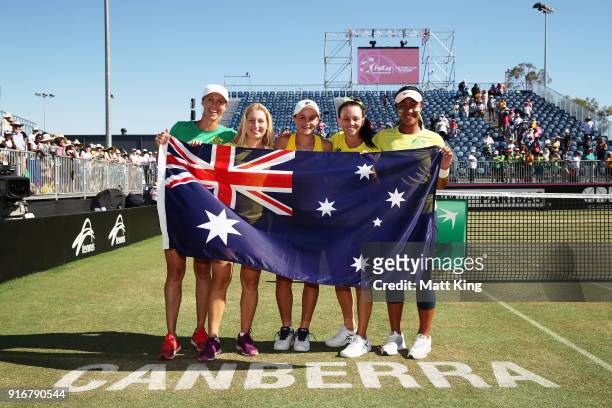 Australia captain Alicia Molik, Daria Gavrilova, Ashleigh Barty, Casey Dellacqua and Destanee Aiava of Australia celebrate victory during the Fed Cup...