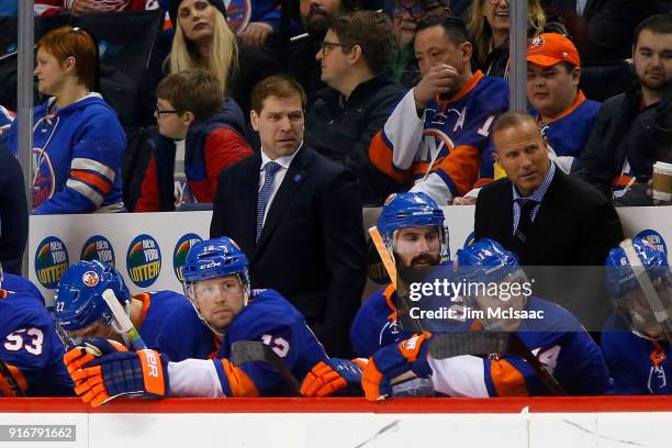 Head coach Doug Weight and assistant coach Greg Cronin of the New York Islanders look on against the Detroit Red Wings at Barclays Center on February...