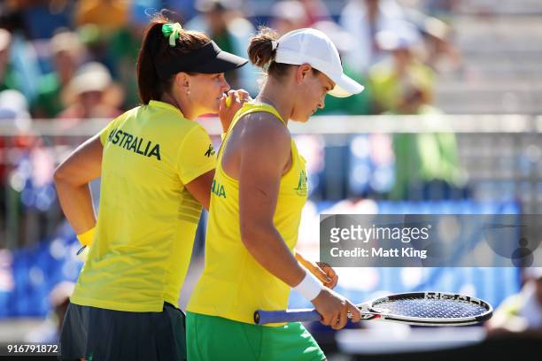 Ashleigh Barty and Casey Dellacqua of Australia play in the doubles match against Lyudmyla Kichenok and Nadiia Kichenok of Ukraine during the Fed Cup...
