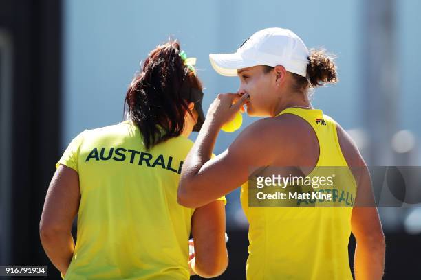 Ashleigh Barty and Casey Dellacqua of Australia play in the doubles match against Lyudmyla Kichenok and Nadiia Kichenok of Ukraine during the Fed Cup...