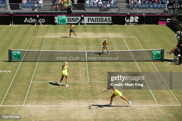 Ashleigh Barty and Casey Dellacqua of Australia play against Lyudmyla Kichenok and Nadiia Kichenok of Ukraine in the doubles match during the Fed Cup...