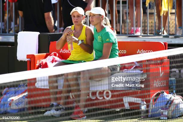 Ashleigh Barty of Australia celebrates victory with Australia captain Alicia Molik in the doubles match against Lyudmyla Kichenok and Nadiia Kichenok...
