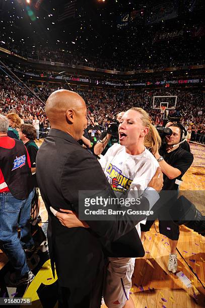 Corey Gaines, head coach of the Phoenix Mercury, congratulates Penny Taylor after defeating the Indiana Fever 94-86 in Game five of the WNBA Finals...